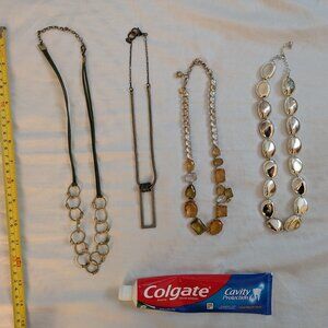 Four necklaces; multiple sources.